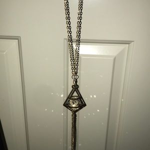 Long gold necklace